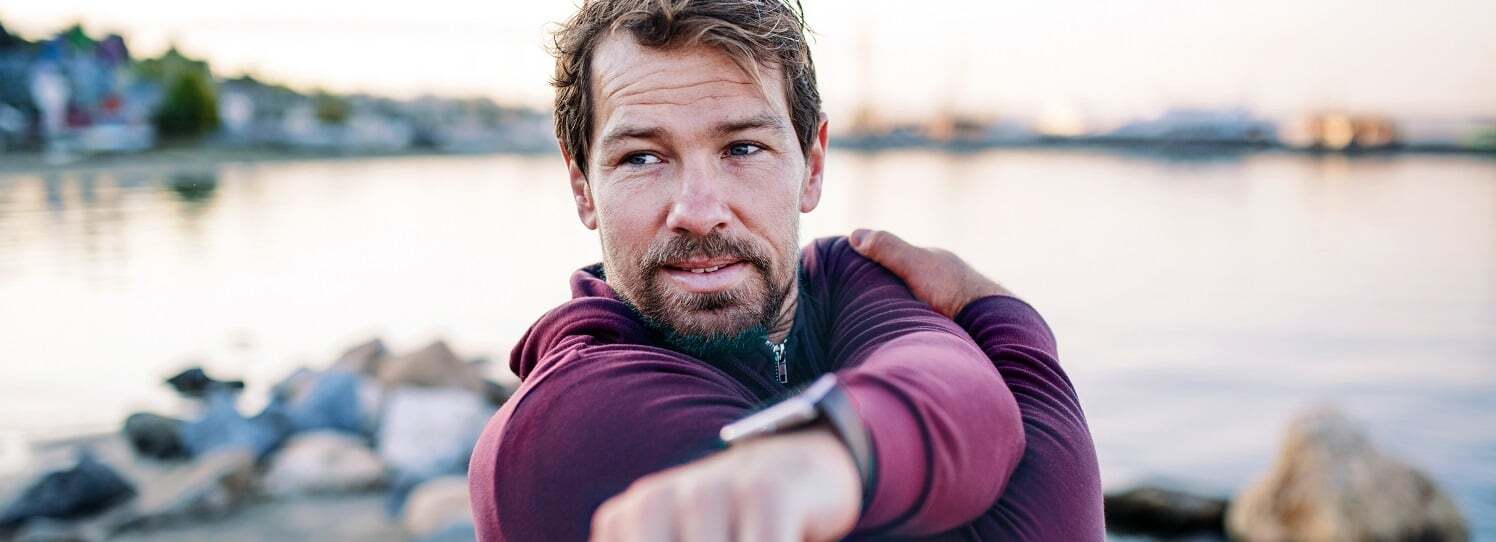 Man stretching after a workout